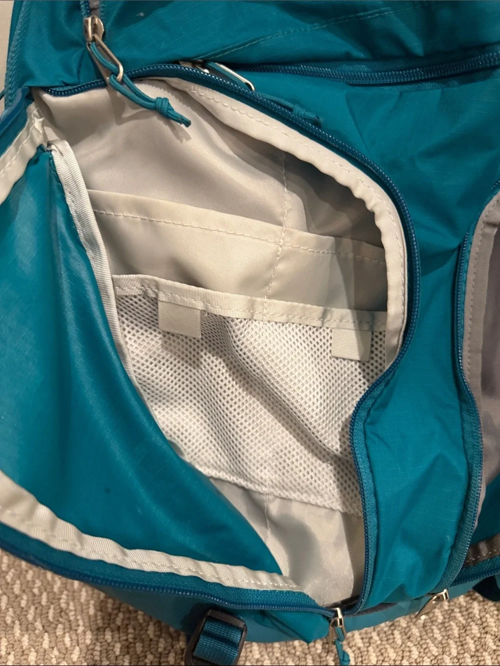 The North Face Surge Backpack in Teal
